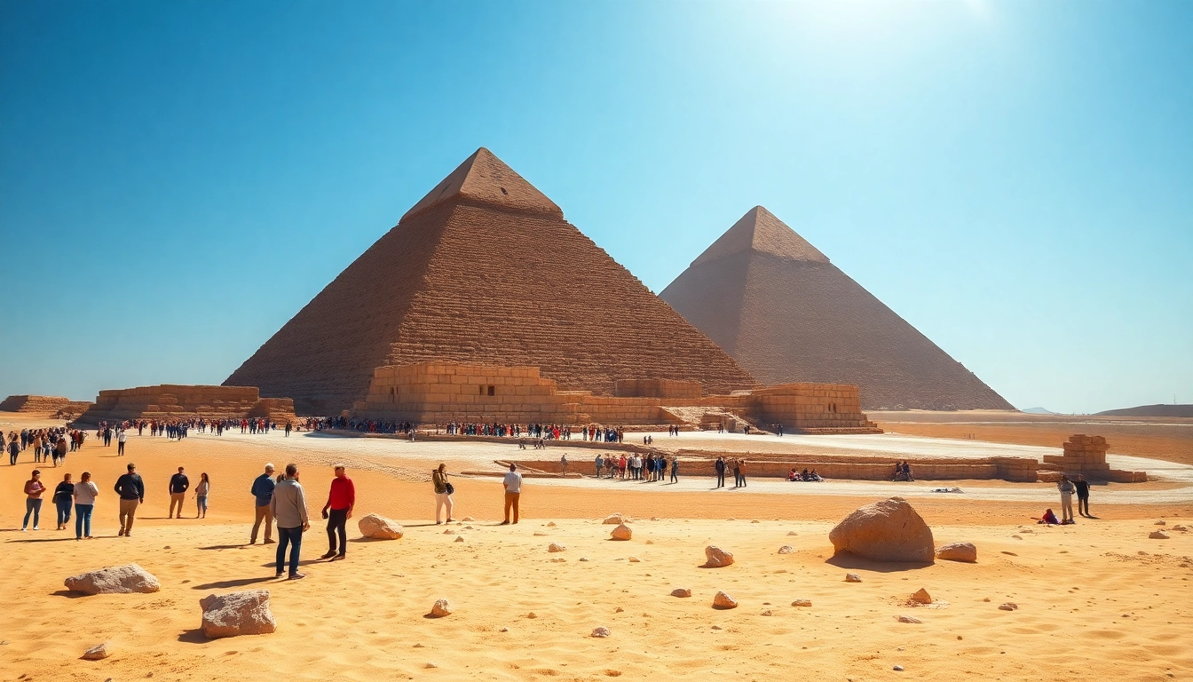 Experience the grandeur of the piraminds against a clear blue sky with tourists in the foreground.